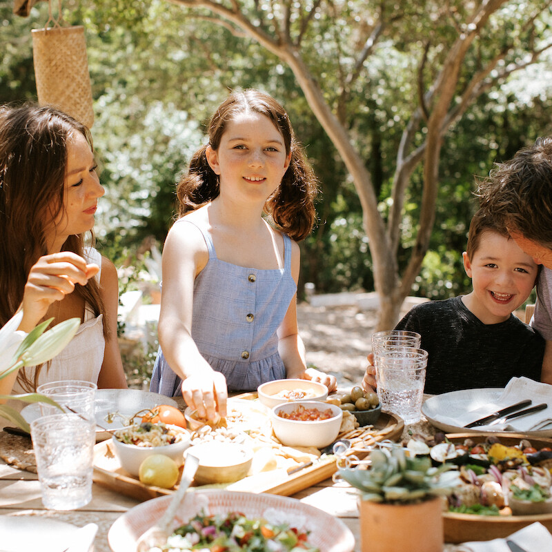 camille styles backyard mediterranean family dinner party with target kebabs and skewers grilling family summer austin